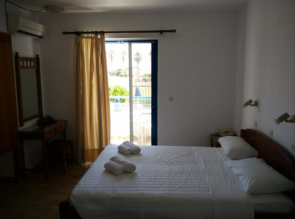 Miros Hotel Apartments Тігакі Номер фото